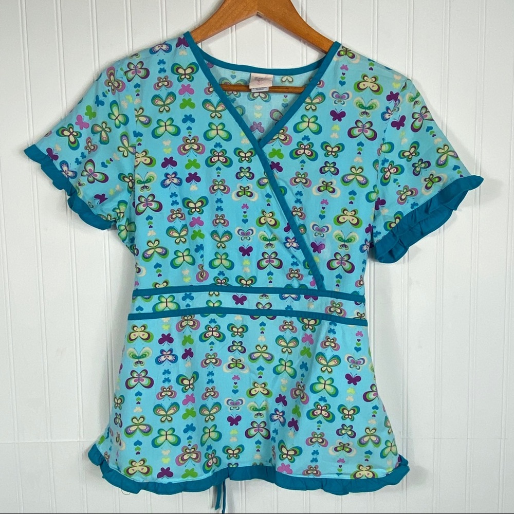Scrub top blue and teal butterfly tie back ruffles